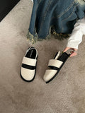 Retro closed toe sandals with an ankle buckle in apricot colour on a white background