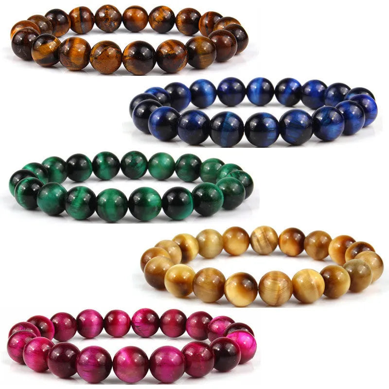 Tigereye crystal bead bracelet showing geometric round beads on a wrist.