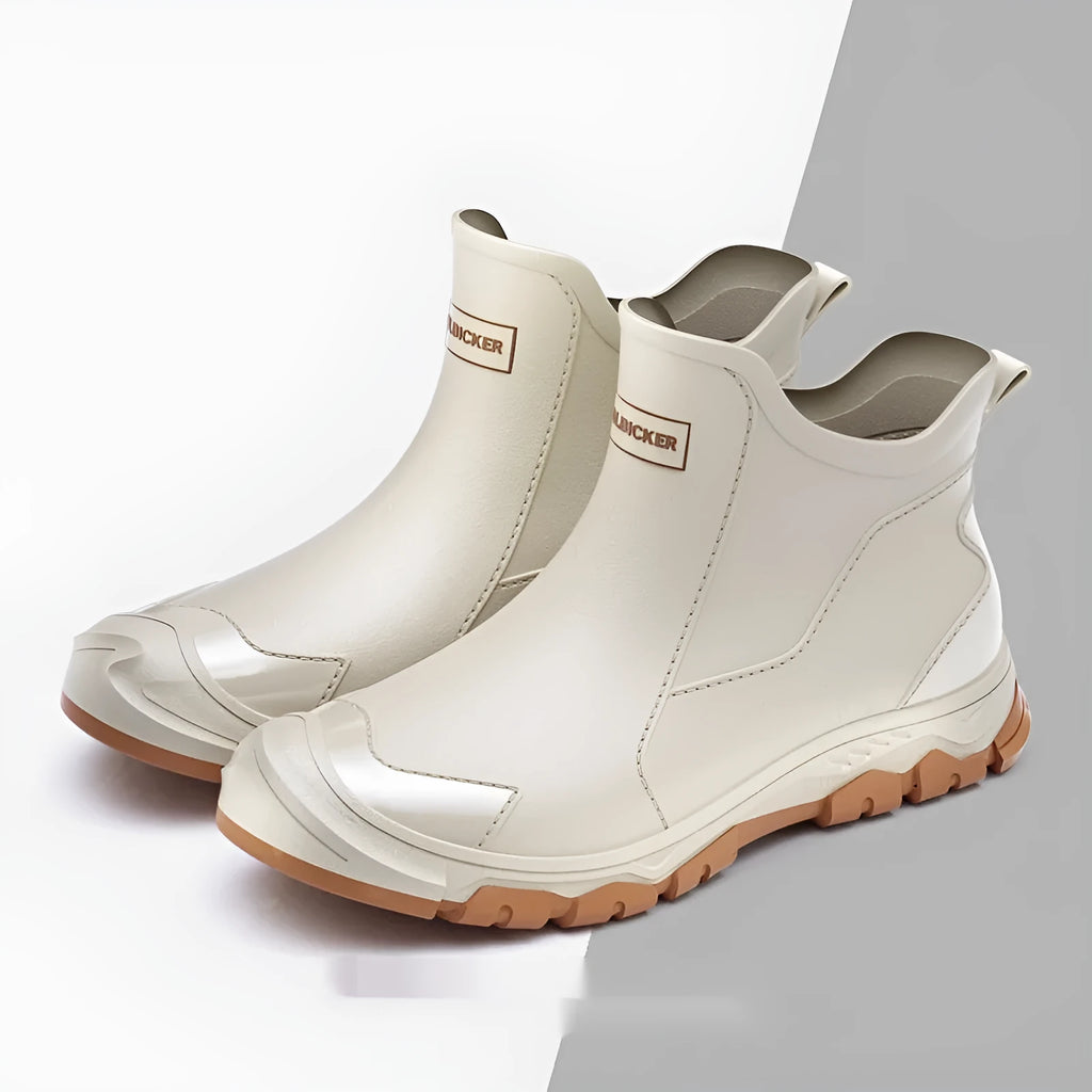 Short tube PVC outdoor wading boots with round toe and flat heel in various colours.