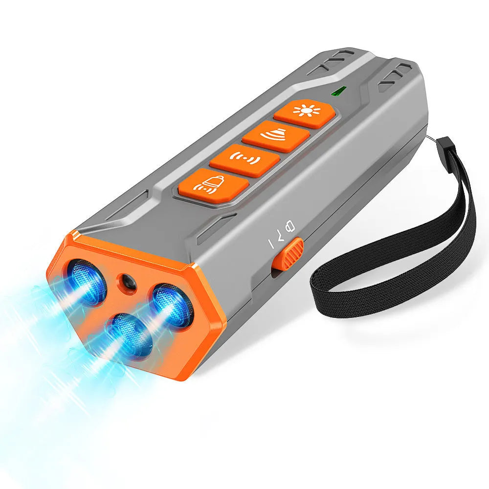 Handheld ultrasonic dog trainer with three sound heads in black and orange ABS plastic.