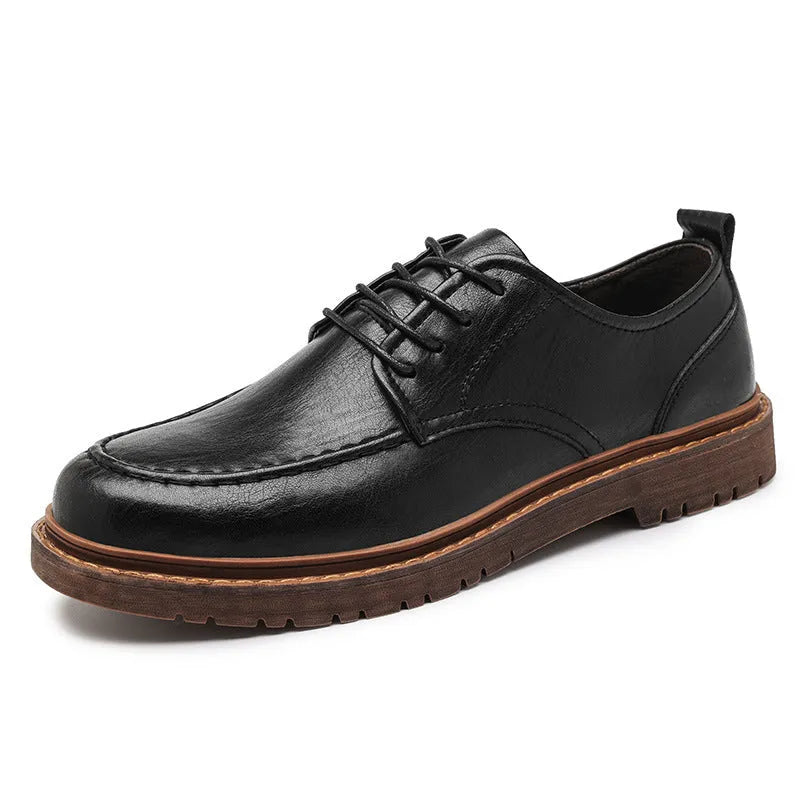 Men's brown leather casual shoes with round toe and flat rubber sole on a white background