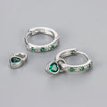 Women's heart-shaped drop earrings with colourful stones in gold or white gold coloured settings