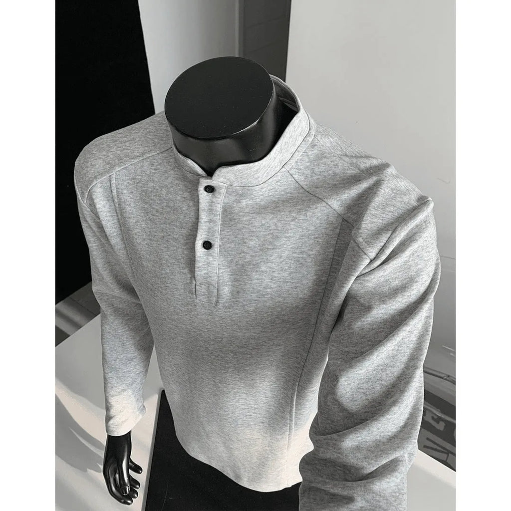 Men's long sleeve polo shirt with stand-up collar and asymmetric patchwork design in loose fitting style