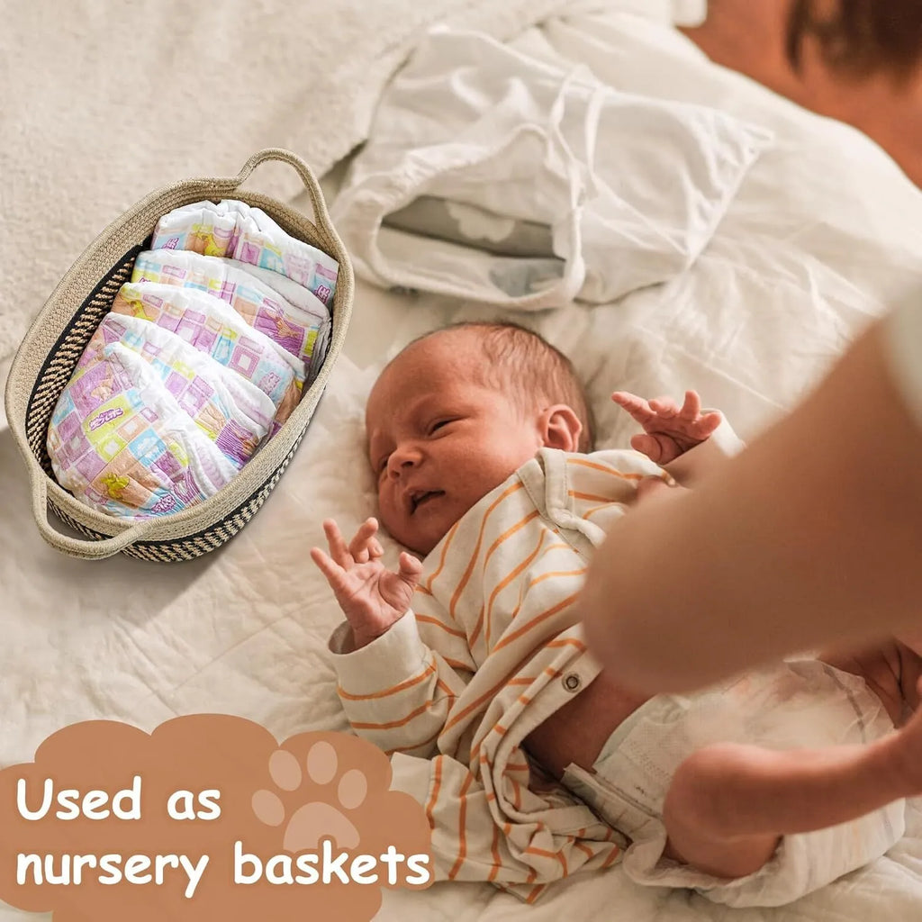 Small light beige handmade cotton rope storage basket with a wooden handle.