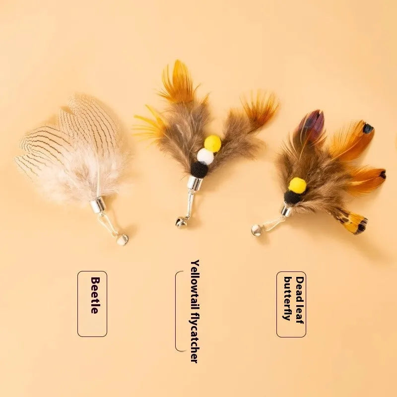 Three cat toy replacement heads with insect designs on steel wire attachments