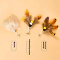 Three cat toy replacement heads with insect designs on steel wire attachments