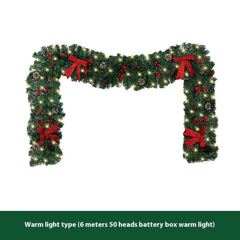 European style Christmas rattan decoration with pine cone bow design, available with coloured or warm white lighting options