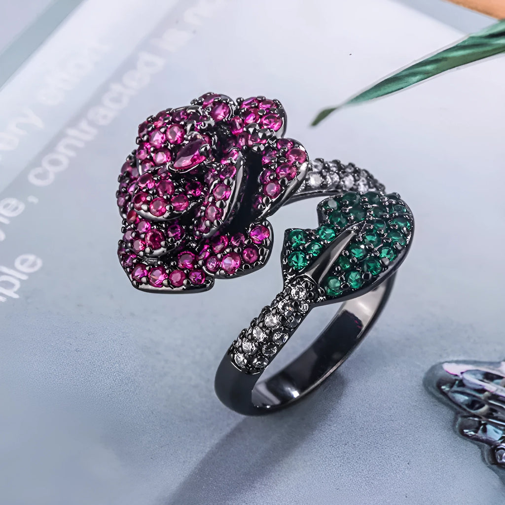 Gold-plated black gold flower personality ring with simulated red corundum stones