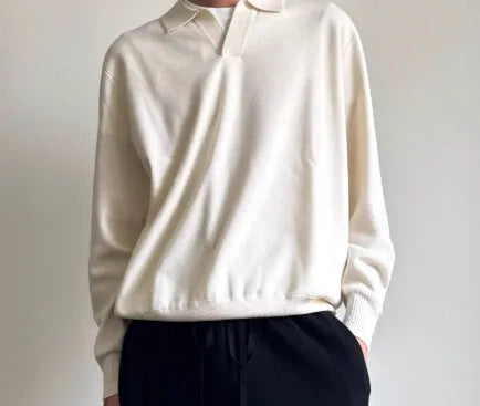 Pure wool loose-fit polo sweater with a lapel collar in navy blue colour.