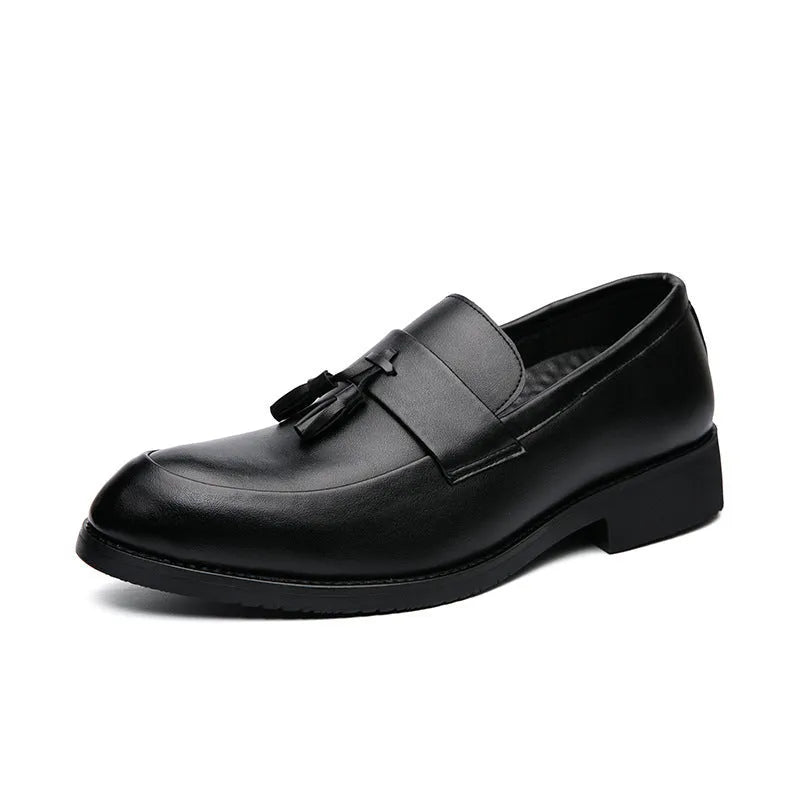 Men's black and brown tassel loafers with a slip-on design and rubber sole for business casual wear.