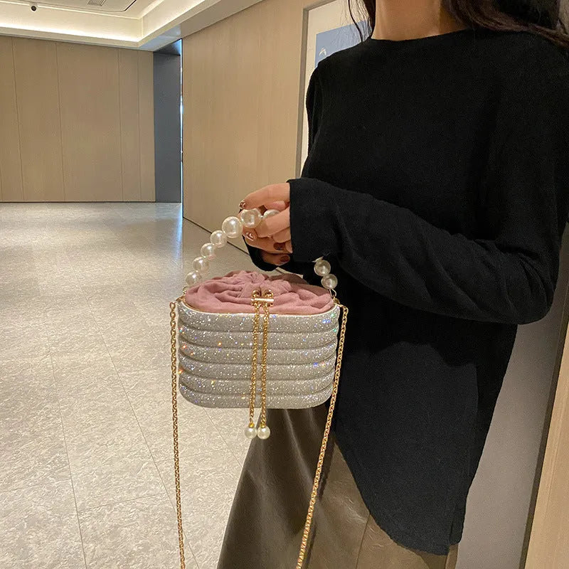 Women's retro style crossbody dinner bag with pearl detailing in soft PU leather