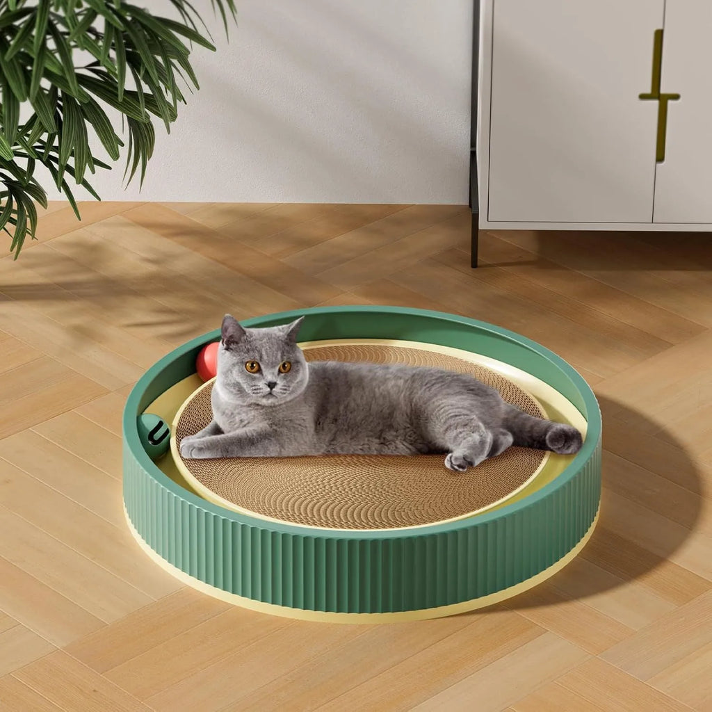 Large circular cat scratching board with integrated ball toys measuring 45cm diameter