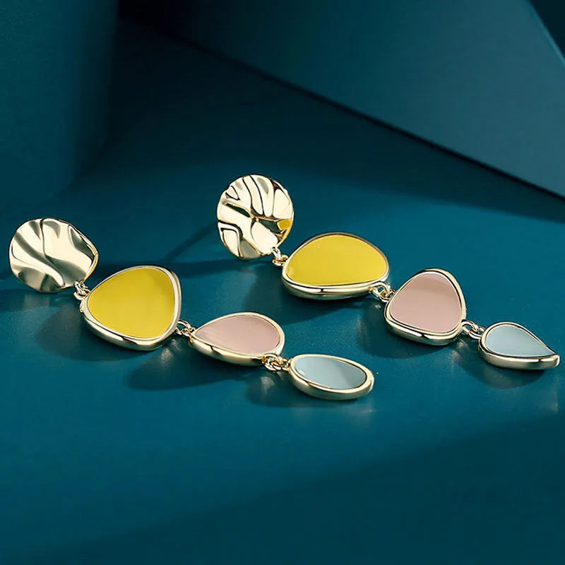 Alloy drop earrings with Morandi colours from oil drip treatment, showing simple vintage disc design.