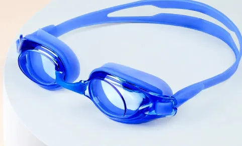 Black myopia swimming goggles with corrective lenses and a storage case on a blue background