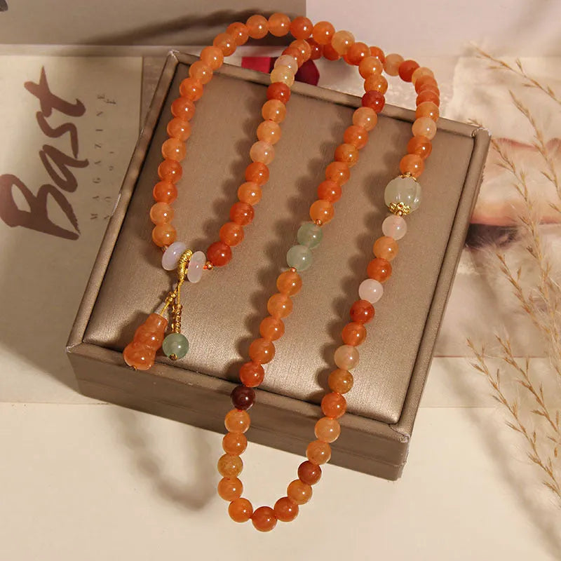Artistic antique natural Jinsi Jade multi-layer bracelet with pumpkin beads and calabash pendant on white background