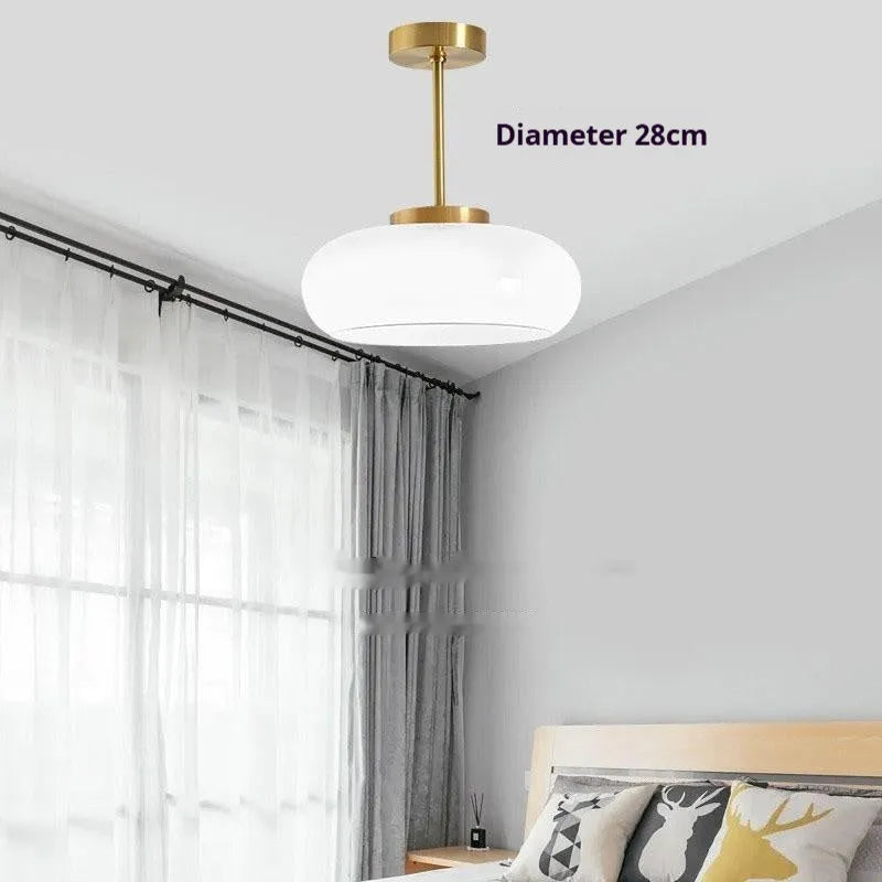 Bauhaus style three-headed pendant light with milk white egg tart glass shades