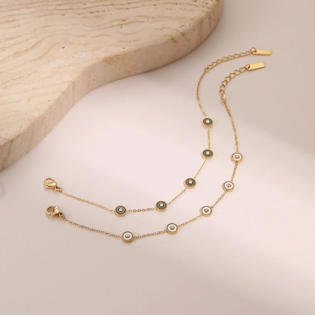 Women's stainless steel bracelet with electroplated 18K gold plating and geometric fritillary design