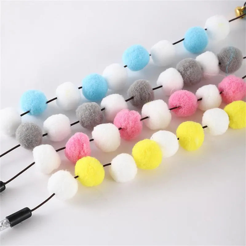 31cm long acrylic cat teaser toy rod with bell and pompon feather attachment in choice of colours
