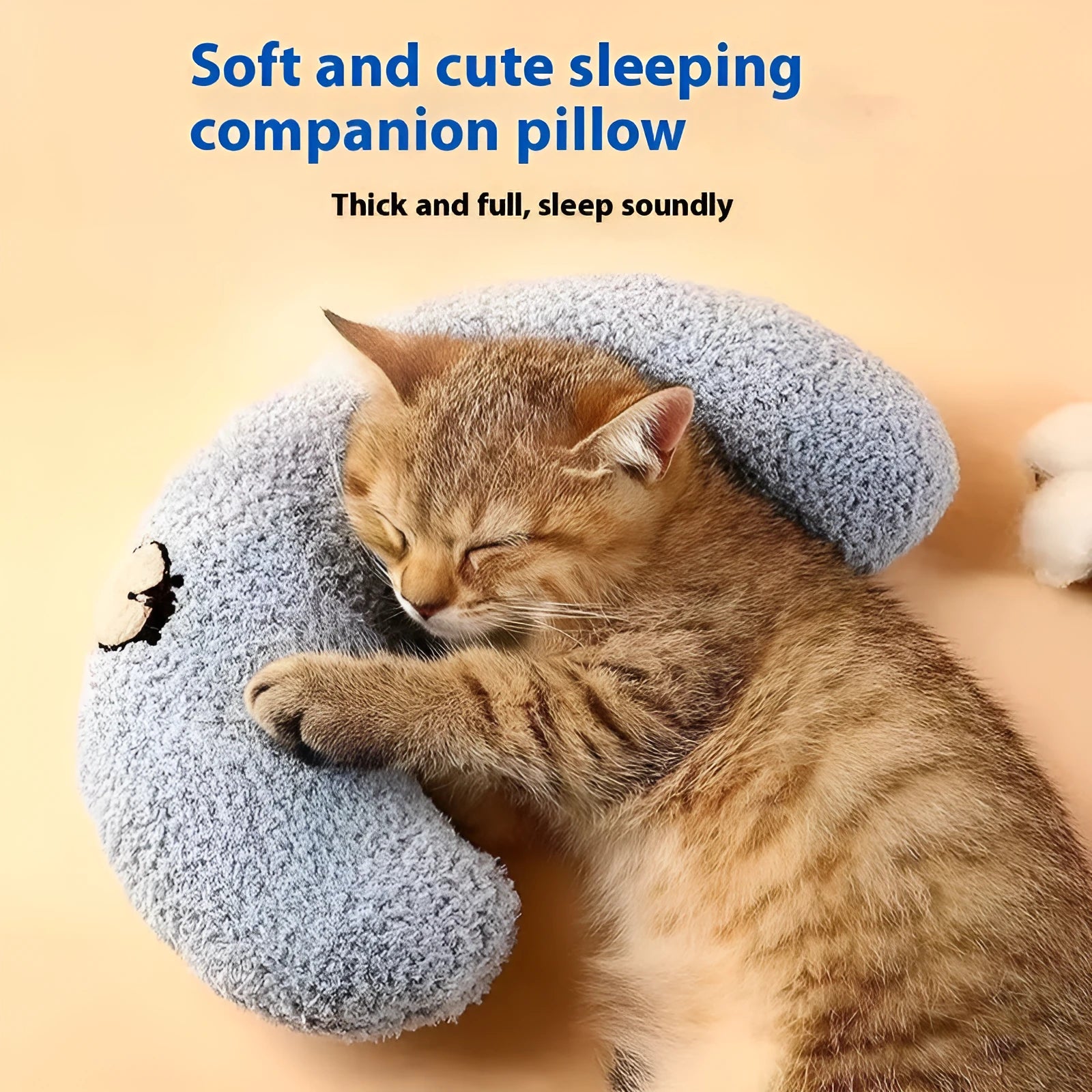 Blue U-shaped cloth pillow for cat neck support, shown in Moon style.