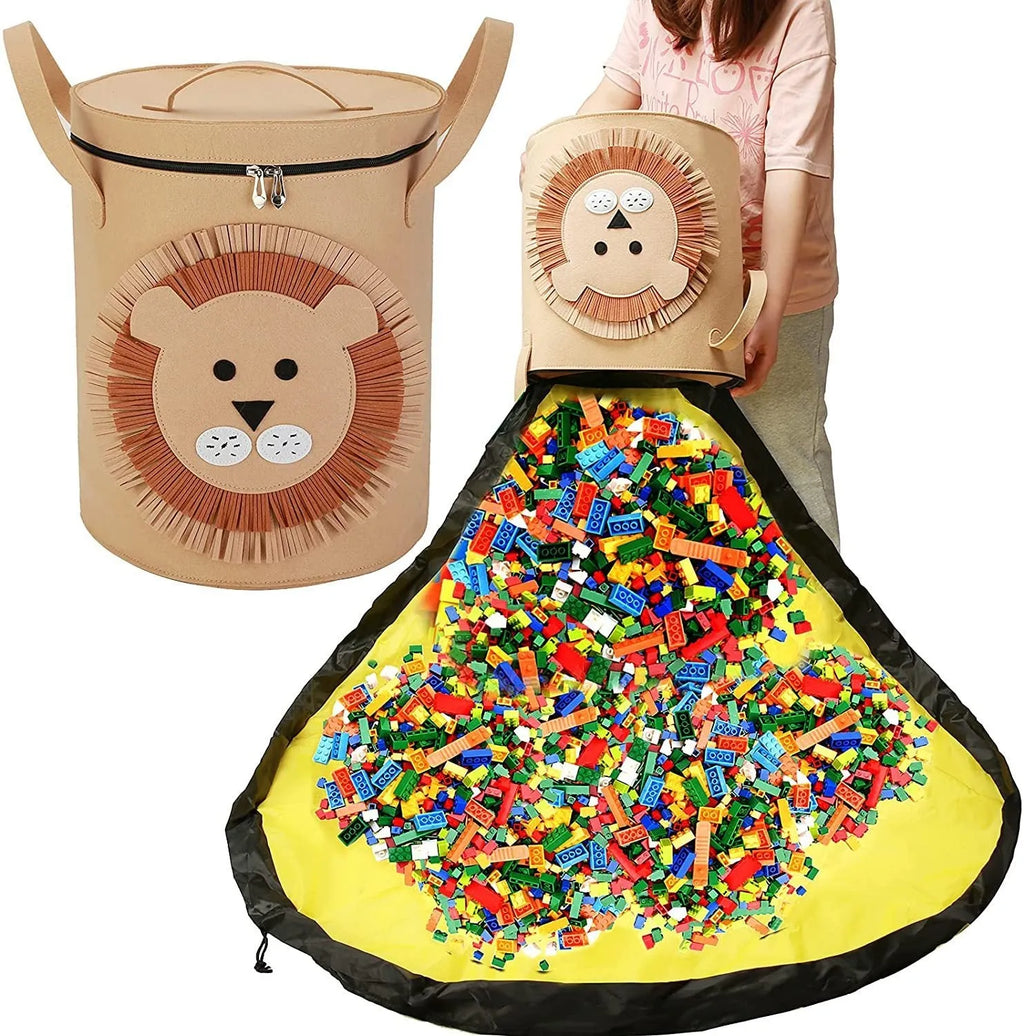 Green felt cube storage bag with pull rope closure lying flat as a play mat.