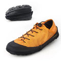 Orange, black, and grey folding outdoor hiking shoes with side zipper, shown in a compact, folded state.