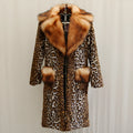 Women's long leopard print artificial fur jacket on hanger, showing regular sleeves and full length.