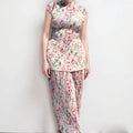 Women's printed chiffon two-piece dress set with long sleeves and a high-waisted skirt.
