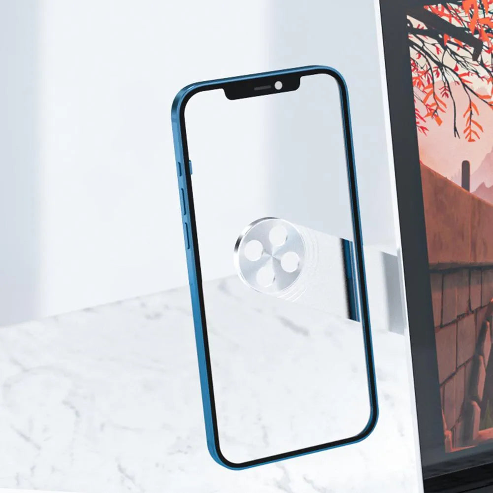 Black aluminium laptop phone holder with magnetic clip attached to a laptop screen, holding a smartphone.