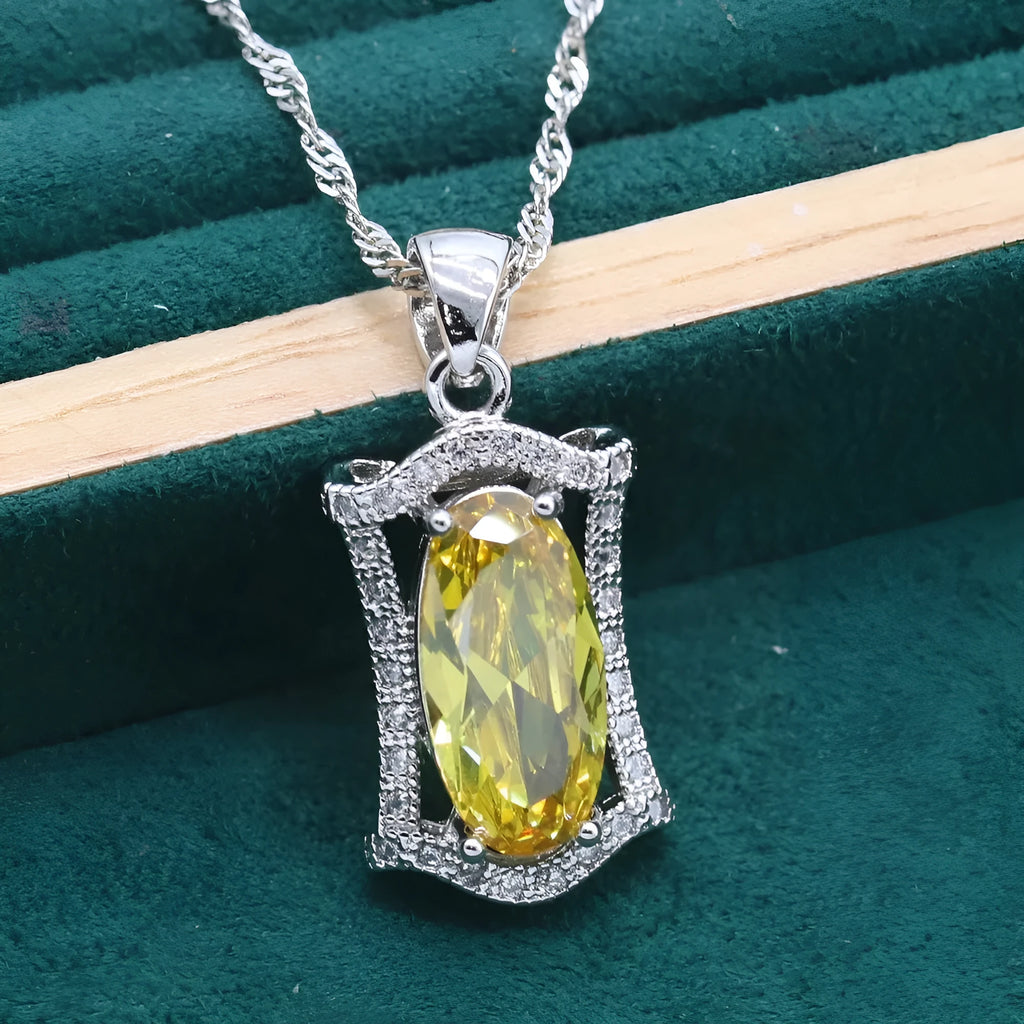 Zircon jewellery set with anti-allergy properties showing necklace, earrings, ring, and bracelet in olive green colour