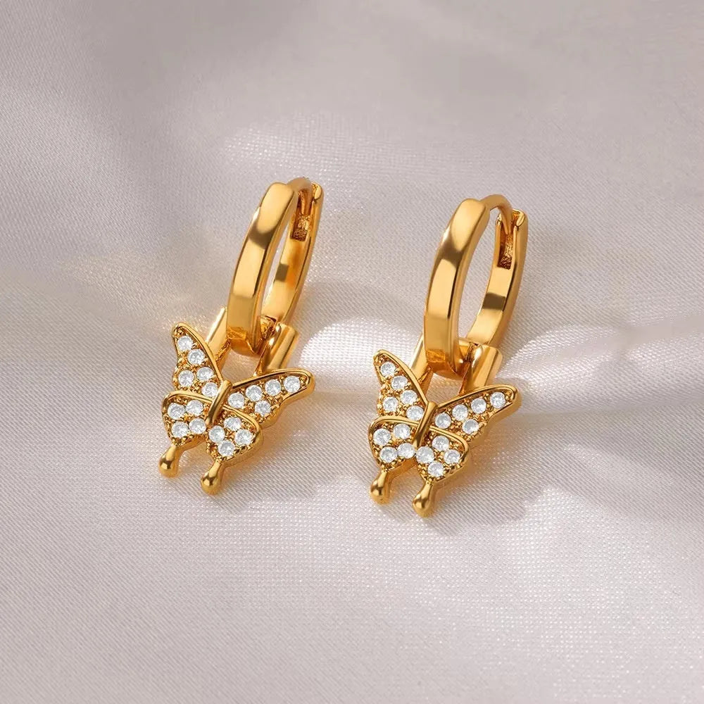 Women's geometric butterfly earrings with heart and star shapes in copper with diamond treatment
