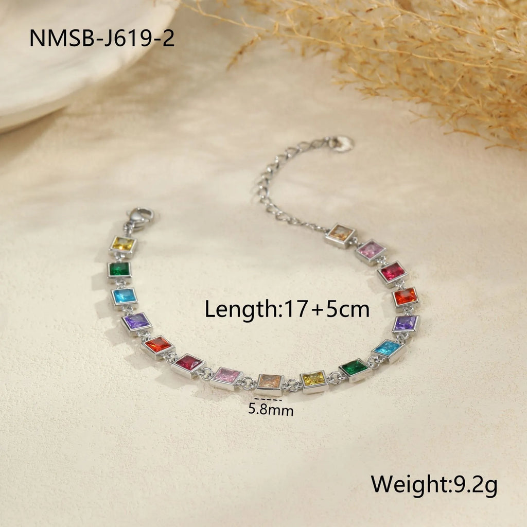 Women's geometric stainless steel bracelet with gold or silver electroplated finish showing heart, circle and square shapes