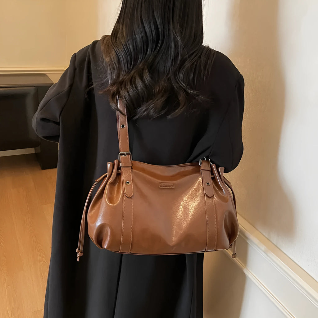 Women's soft PU crossbody underarm bag in horizontal square shape, measuring 48x13x20 cm, available in black, brown, coffee colours.