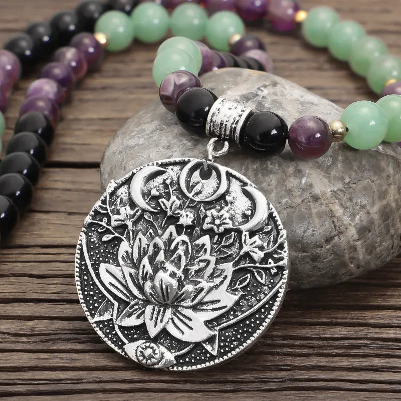 Handmade geometric lotus pendant necklace with stone bead chain and matching bracelet.