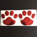 Pair of hand-shaped dog footprint car stickers in four colour options, each 7 cm long.