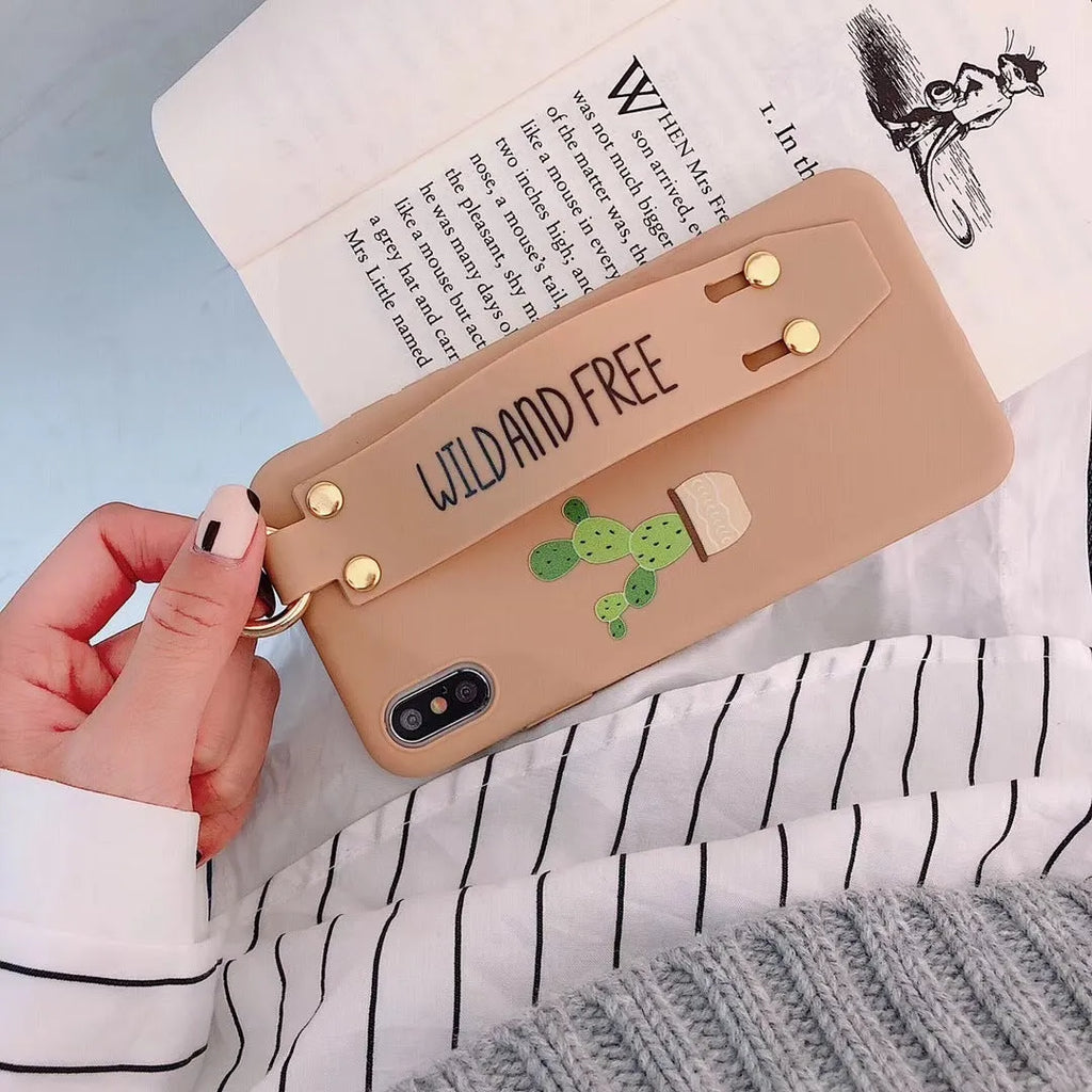 Green graffiti design phone case with a detachable silicone wristband, shown fitted on an iPhone.