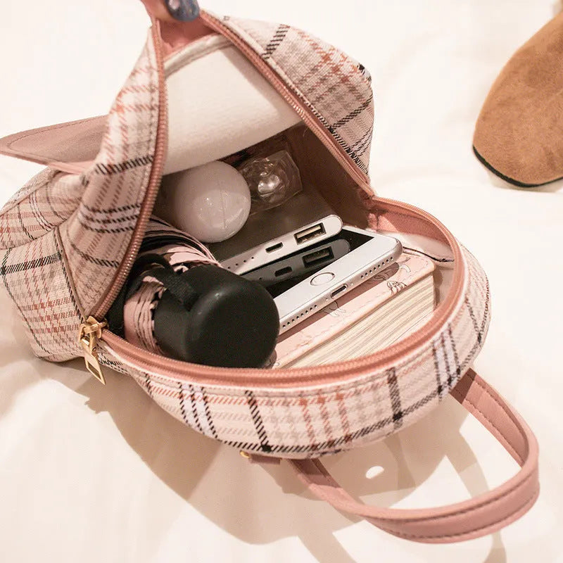 One shoulder diagonal phone bag in PU fabric available in black, blue, brown, pink, and red colours.