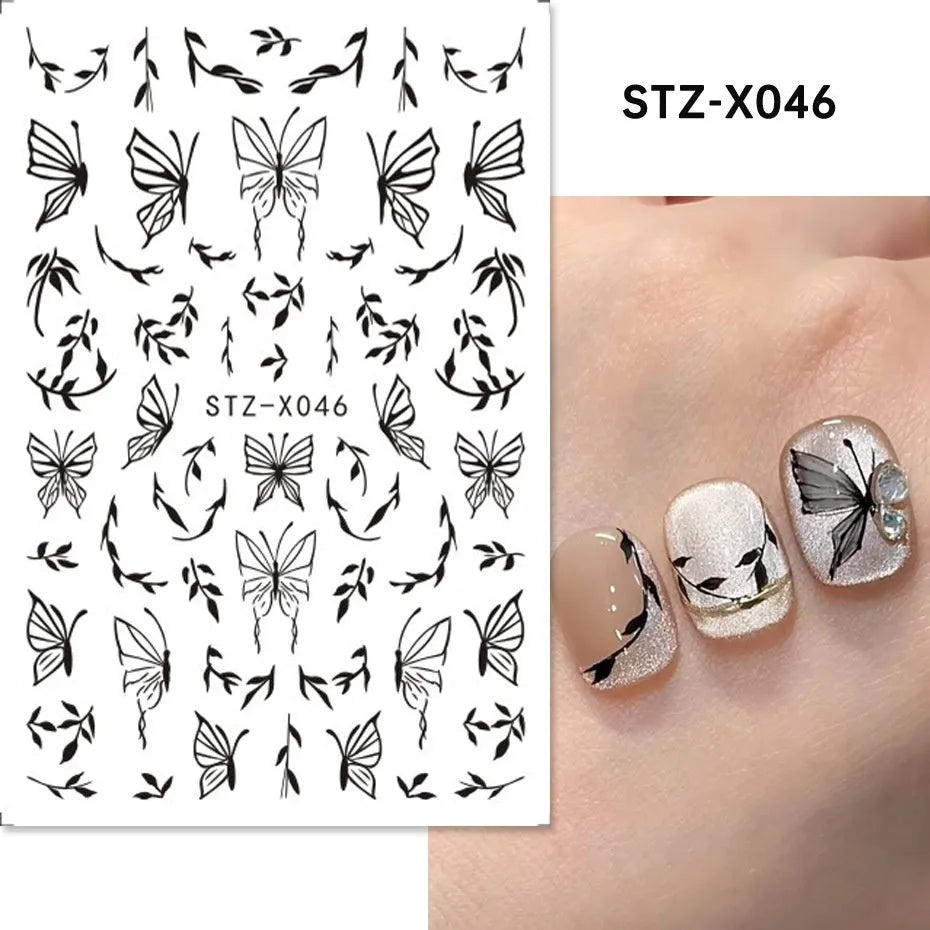 Set of 60 black and silver cartoon pattern nail strip stickers with plastic application patch.