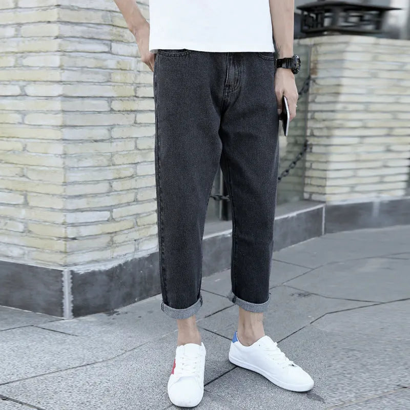 Men's black loose straight-leg jeans with small harem design on cotton fabric