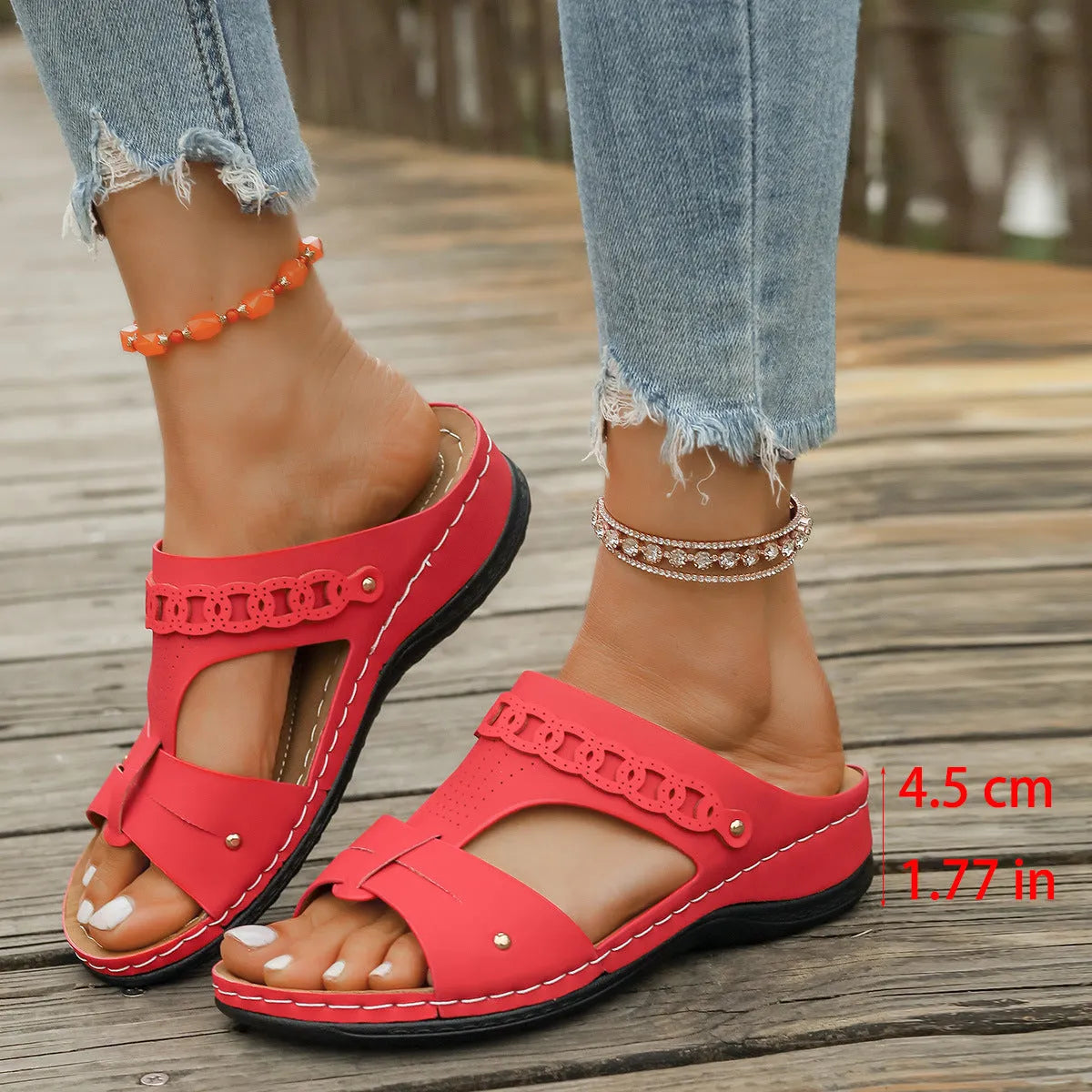 Casual slope heel roman style slippers in blue with fish mouth toe design and rubber sole.