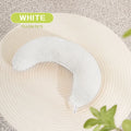 U-shaped blue cat pillow with adjustable white collar on a blanket