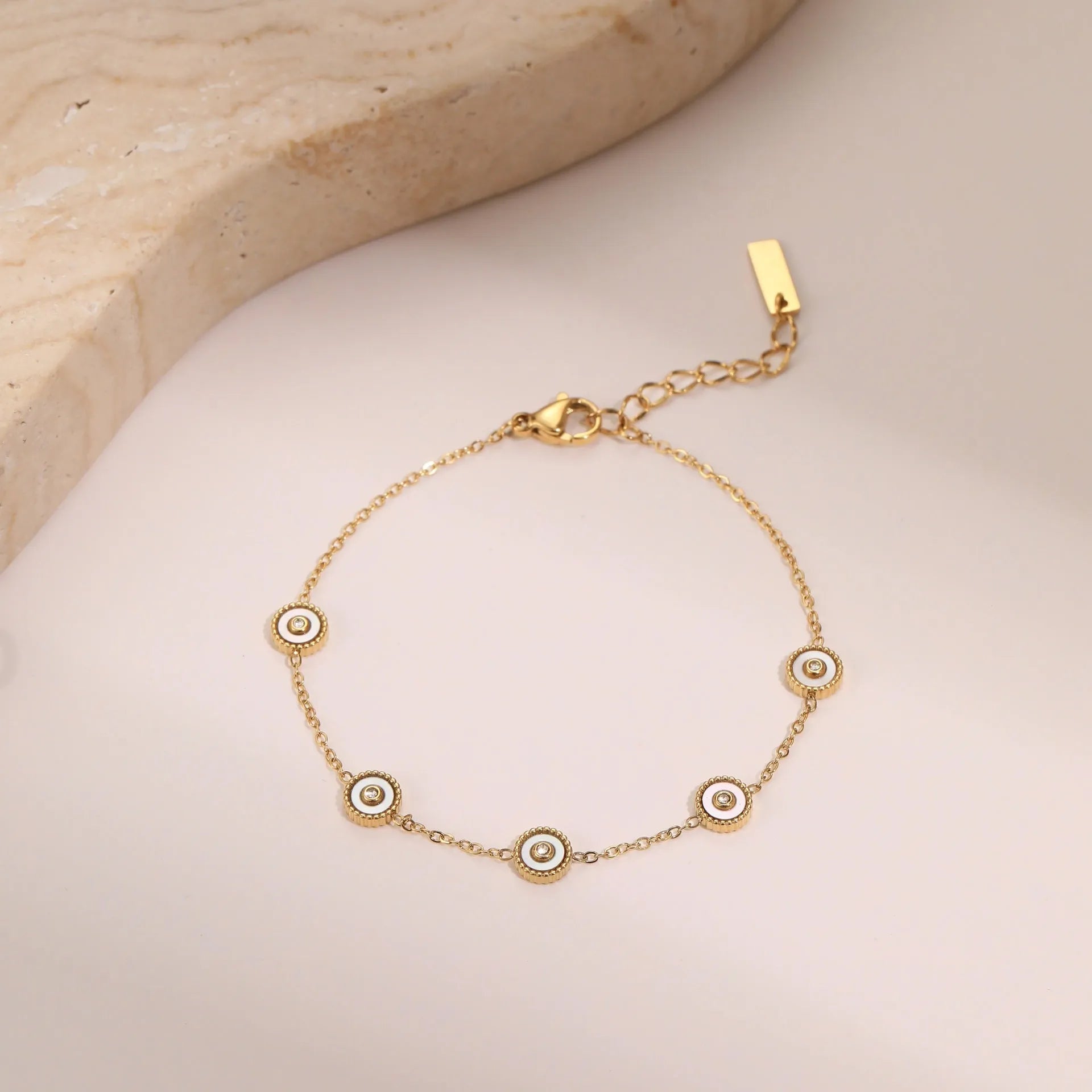 Women's stainless steel bracelet with electroplated 18K gold plating and geometric fritillary design