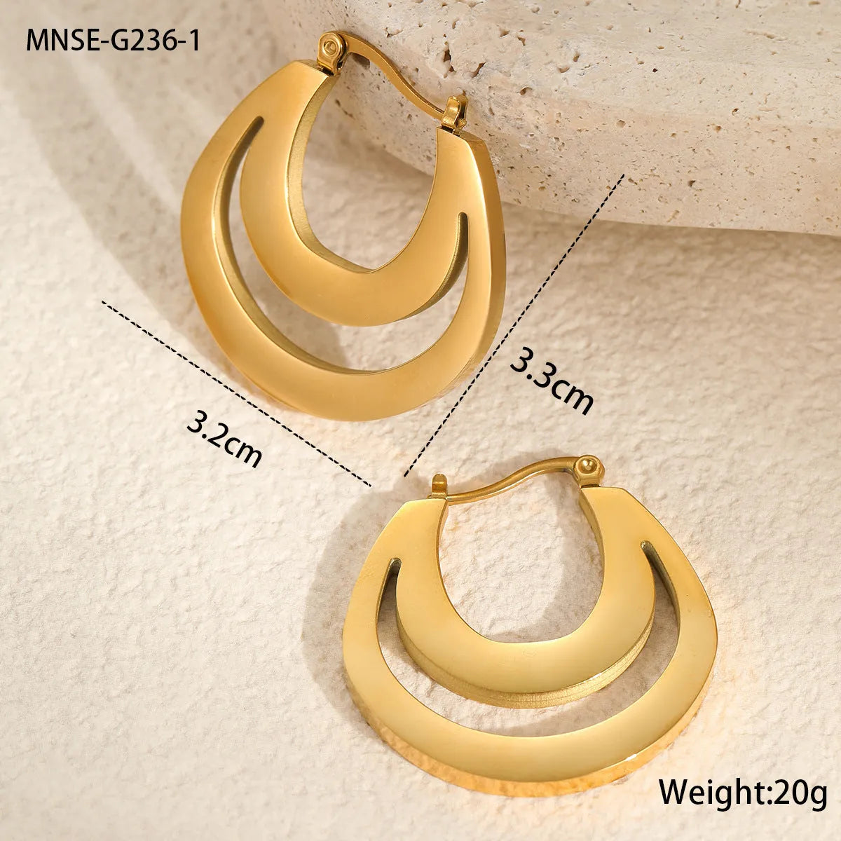 Geometric French earrings with round ring elements in gold and steel colour options