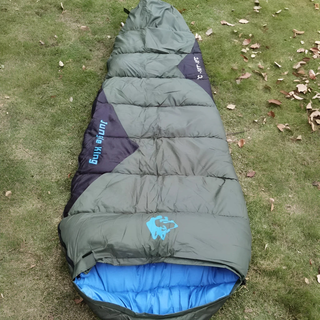 Cotton camping sleeping bag in army green with compression sack, size 230cm long.