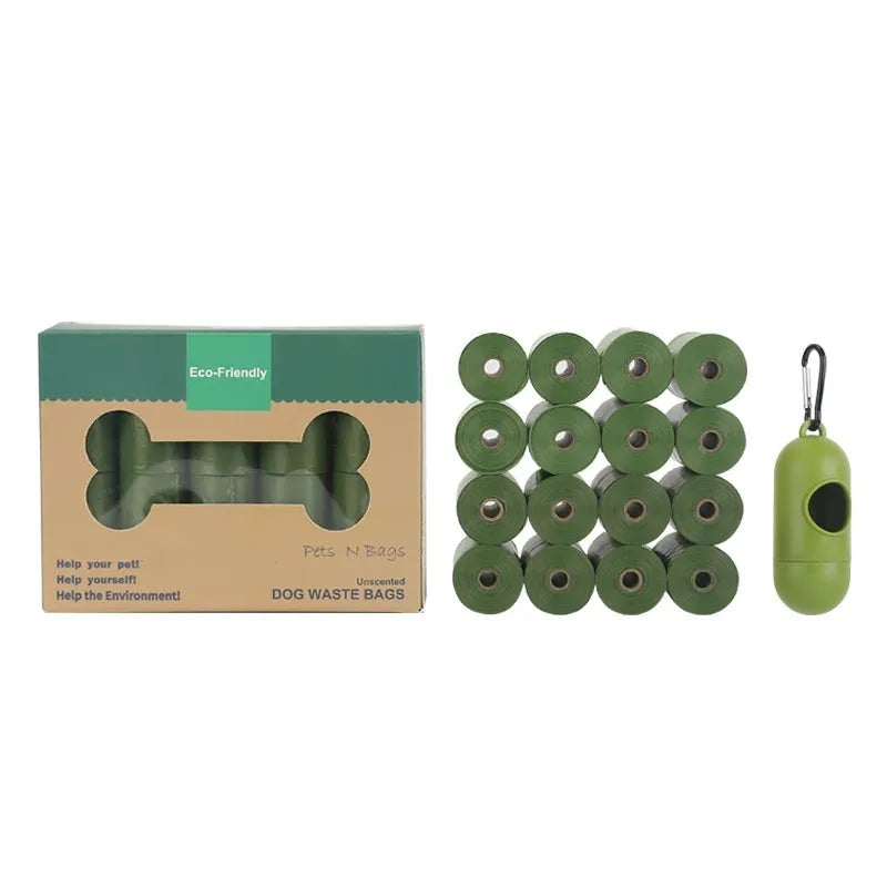 EPI degradable thickened pet waste bags on a roll, showing green colour variant next to a dispenser.