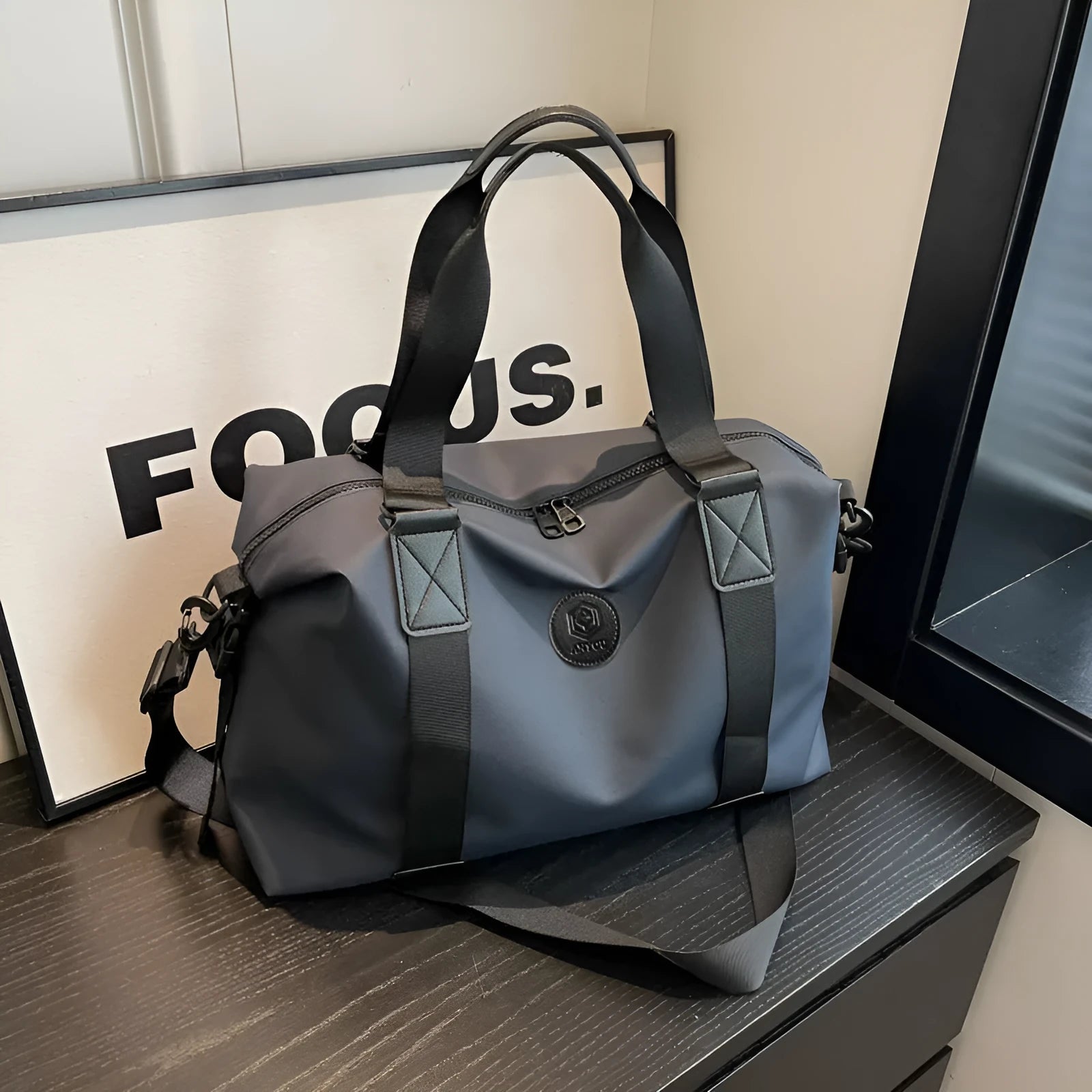 Large black travel rucksack made from Oxford cloth with breathable back padding and multiple compartments.