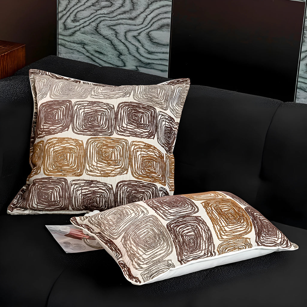 Square and waist pillow covers with cream and coffee abstract coil pattern