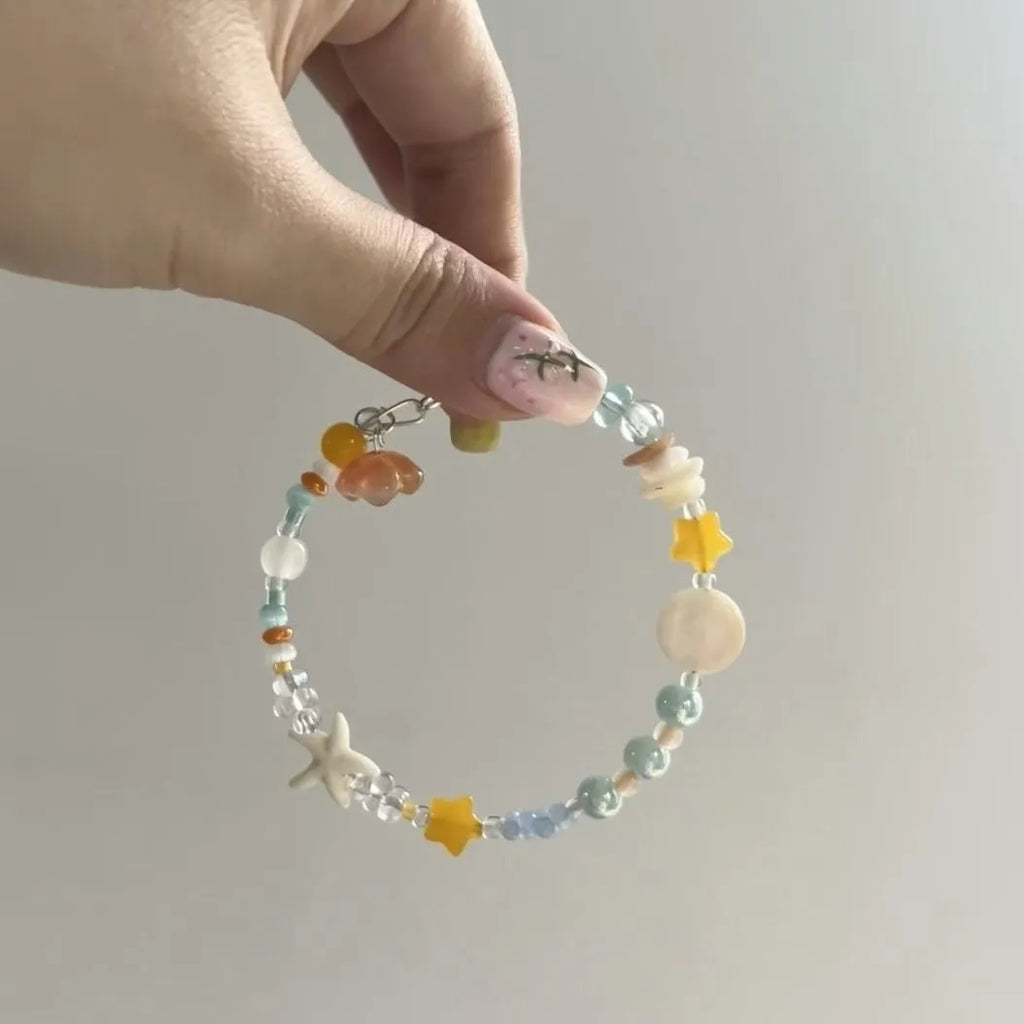 Orange-themed alloy bracelet with diamond shapes and round elements for women in colour Bracelet 0213
