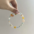 Orange-themed alloy bracelet with diamond shapes and round elements for women in colour Bracelet 0213