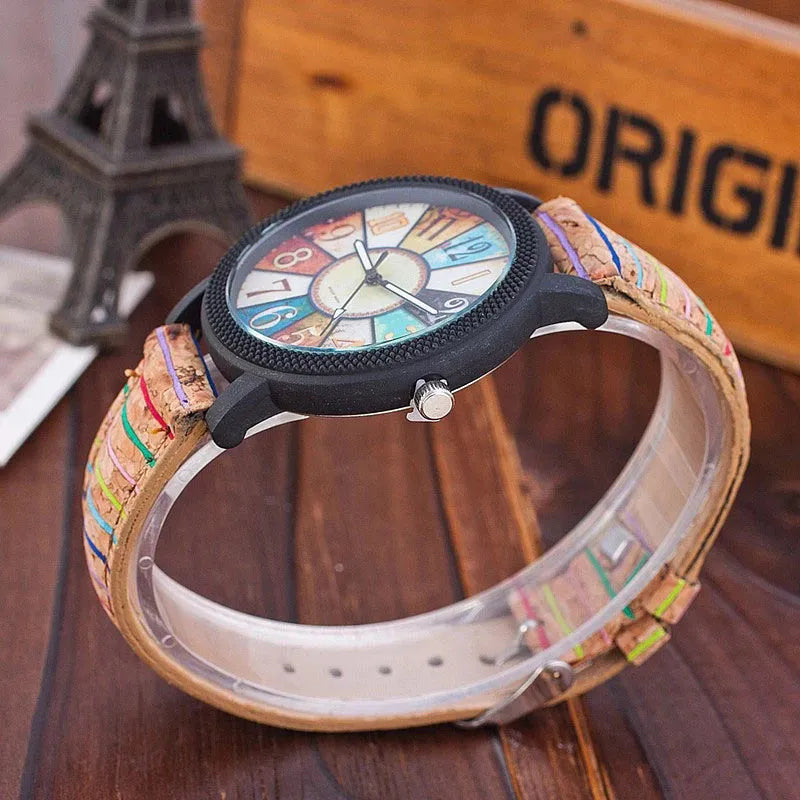 Women's vintage-style quartz watch with brown leather strap and silver round 37mm dial.