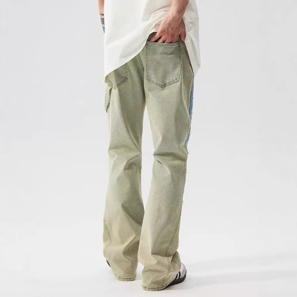 Yellow and blue retro patchwork splash-ink damaged design jeans with mid-waist fit and zip fly